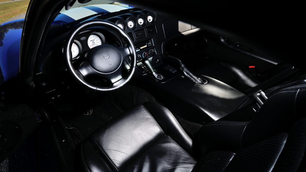 Black plastic and leather dominated the Dodge Viper GTS's cabin