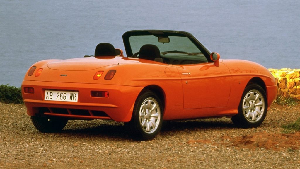 A sports car with steel wheels. Can it get more 1990s than that? (source: WheelsAge)