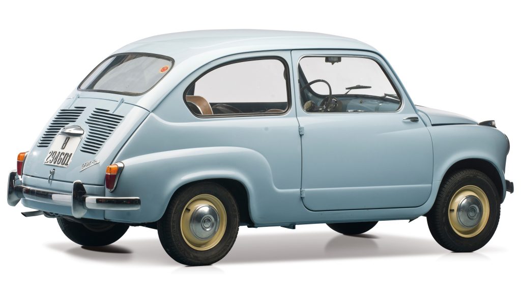 Rear quarter view of the 1957 SEAT 600 in light blue