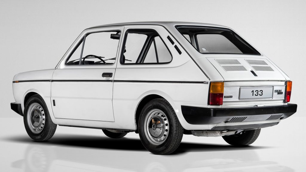 Rear quarter view of the 1974 SEAT 133 in white