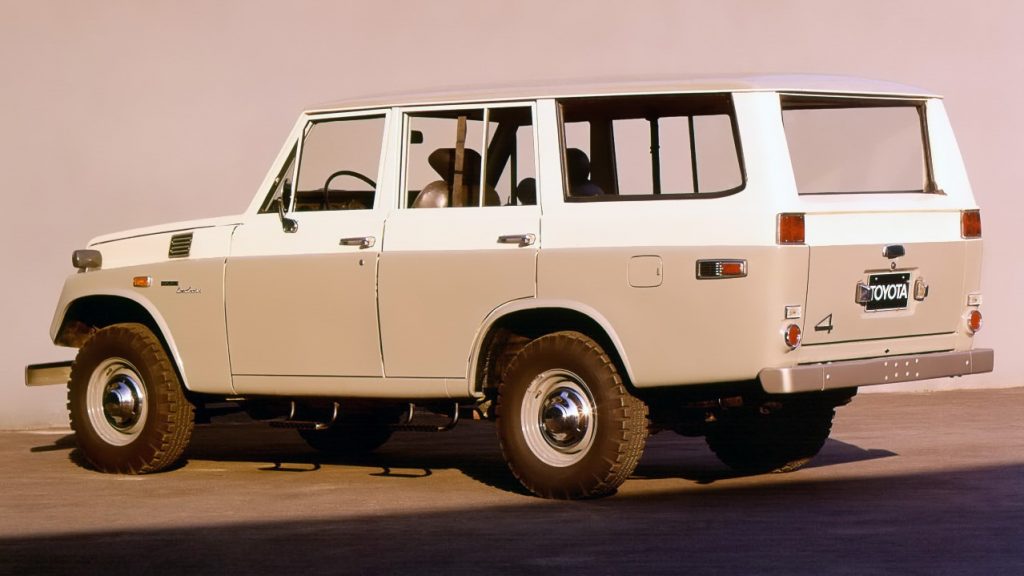 Side view of the 1968 Toyota Land Cruiser in white over beige